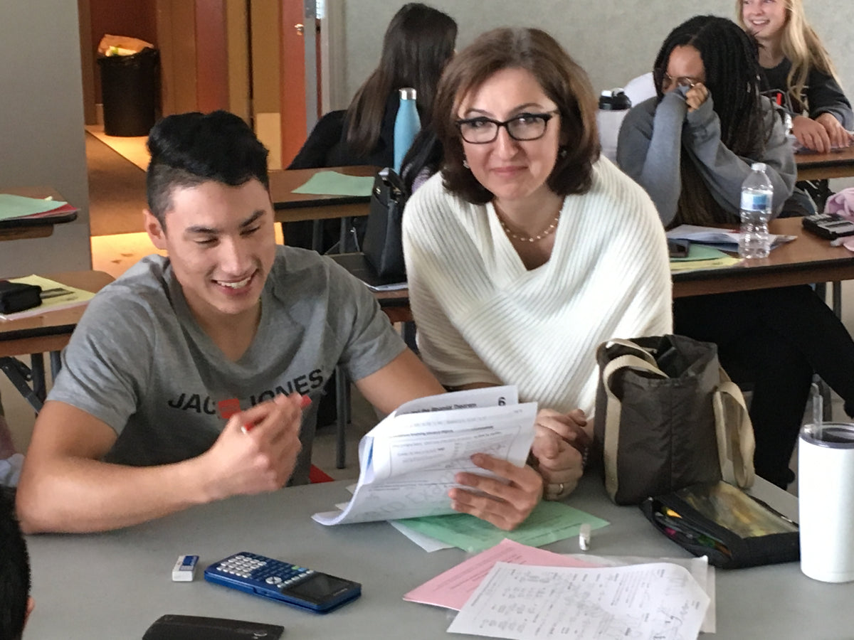 Teacher supporting a student at Canyon Meadows — Canyon Meadows, Calgary