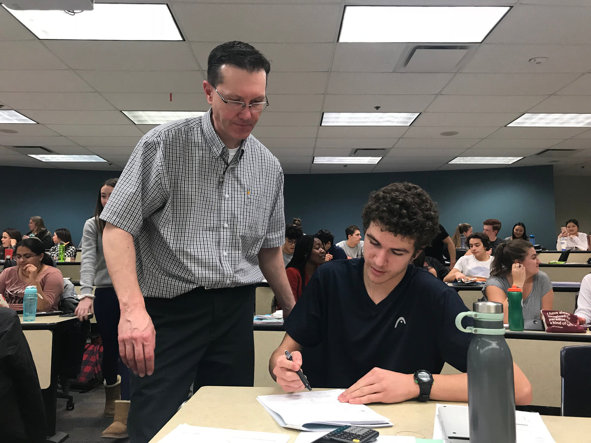 Teacher helping Math students at SAIT — SAIT, Calgary